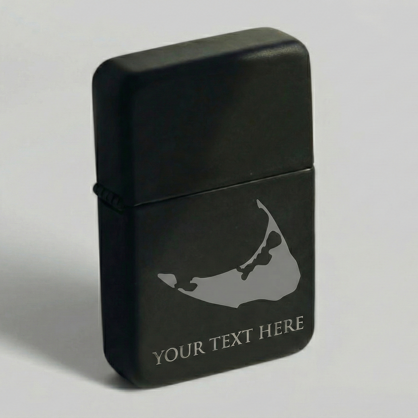 Black zippo lighter with a design and 'Your Text Here' text on a light gray background